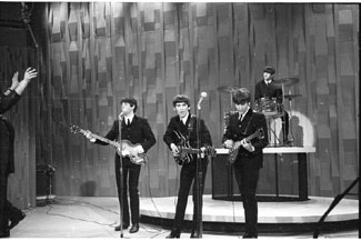 Unique black and white photos taken in 1964 of the Beatles appearing the Ed Sullivan Show, on their way by train to a Washington performance and arriving in Adelaide are among an unusual collection of entertainment memorabilia auction from noon Thursday May 7.