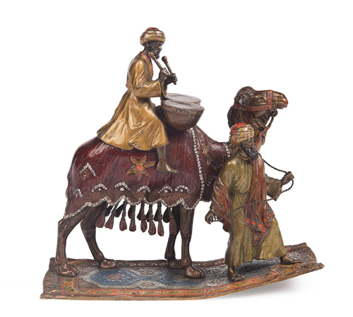 Of particular note at Mossgreen Quarterly Collectors Auction Series is an Austrian (Franz Bergman manner) cold painted bronze of a camel led by an attendant and ridden by a Bedouin playing drums.