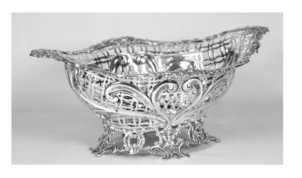 Items from the Breasley estate include a Victorian silver basket made in 1893 by London silversmiths William Comyns & Sons and presented to Breasley and his wife May in 1950-51 from the Simmons family (above). 