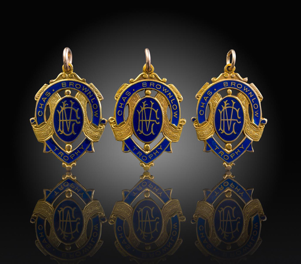 The three Brownlow Medals (awarded each year to the best and fairest Australian Rules Football player) won by Essendon legend Dick Reynolds will be part of Mossgreen’s forthcoming Sporting Memorabilia auction on 15 August at their rooms in Armadale. 
