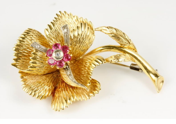 The items belonged to gold merchant the late Peter Davis and will be held online over four days from Monday June 27 to Thursday June 30 through Melbourne-based Philips Auctions at 47 Glenferrie Road, Malvern. Lots on day 2 include a vintage ruby and diamond set gold floral brooch (lot 701), estimated at $300-600 