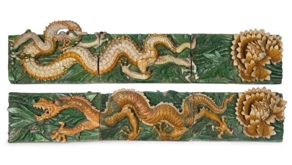 The pair of antique Chinese 17th century late Ming or early Qing Dynasty ceramic architectural panels with green and gold dragon decorations sold for $14,500 on a $4500-$5500 catalogue estimate.